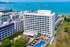 an aerial view of a building with a pool at The Bayview Hotel Pattaya in Pattaya Central