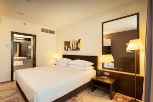 Postel nebo postele na pokoji v ubytování DoubleTree By Hilton Košice