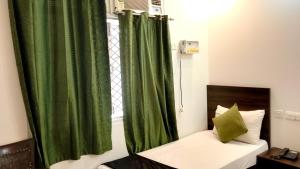 Postel nebo postele na pokoji v ubytování hotel julee