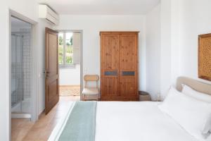 Postel nebo postele na pokoji v ubytování Hotel Dosterras