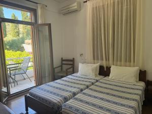 Pythaïs Hotel客房内的一张或多张床位