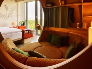 Postel nebo postele na pokoji v ubytování 25hours Hotel Bikini Berlin