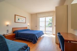 Postel nebo postele na pokoji v ubytování Verdeluna ApartHotel + 37 fotografií