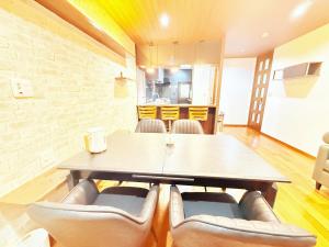 a dining room with a table and chairs at 西戸崎3丁目8番1号 in Fukuoka +23 photos