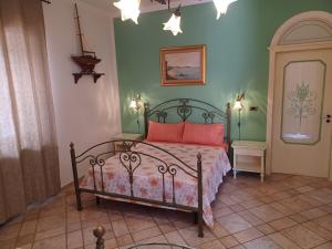 Posteľ alebo postele v izbe v ubytovaní Casa Vacanze Nantò 2
