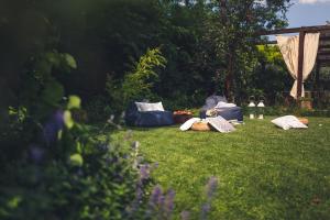 a group of people laying on the grass in a yard at PranaVita, B&B Naturale in Pesaro