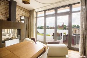 Postel nebo postele na pokoji v ubytování Ringelnatz Inselhotel