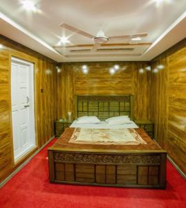 Voodi või voodid majutusasutuse Serenity Inn Skardu toas