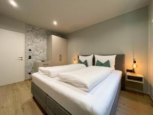 Ένα ή περισσότερα κρεβάτια σε δωμάτιο στο Apartments LIANA