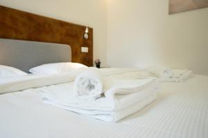 Ένα ή περισσότερα κρεβάτια σε δωμάτιο στο Modern Studio with Queen-Size Bed, Self Check-in