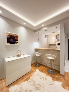 Η κουζίνα ή μικρή κουζίνα στο Modern 1-bedroom apartment M25