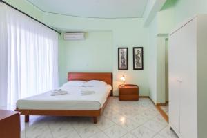 Postel nebo postele na pokoji v ubytování Villa Nayas