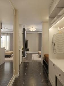 a hallway leading to a living room with a hallway at Soc Village Wellness & Retreat in Sóc Sơn