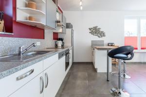 Η κουζίνα ή μικρή κουζίνα στο Ferienwohnung "Colonia"