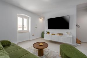 Μια τηλεόραση ή/και κέντρο ψυχαγωγίας στο Casa Riccardo Funtana