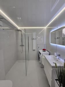 Ένα μπάνιο στο Apartament Mielno