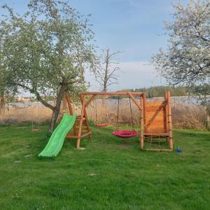 Detský kútik v ubytovaní Mazury Home + 37 fotografií