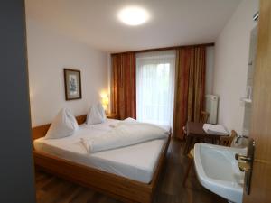 Posteľ alebo postele v izbe v ubytovaní holiday home Bergheim, Fügen