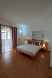 Postel nebo postele na pokoji v ubytování Casa TIANA