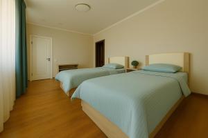 Postel nebo postele na pokoji v ubytování SEDEP Guesthouse