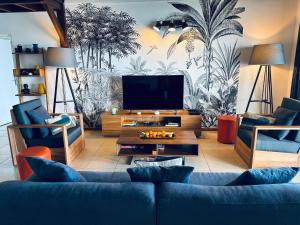 Khu vực ghế ngồi tại Le Grand Bleu T5 Haut standing, vue mer et pieds dans l'eau