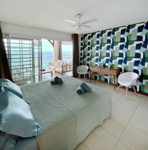 Khu vực ghế ngồi tại Le Grand Bleu T5 Haut standing, vue mer et pieds dans l'eau