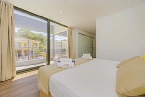 Ένα ή περισσότερα κρεβάτια σε δωμάτιο στο Villa Jade I +36 φωτογραφίες