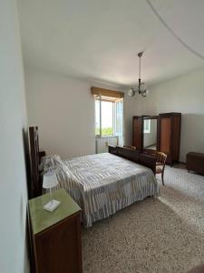 Ένα ή περισσότερα κρεβάτια σε δωμάτιο στο Casa Letrei