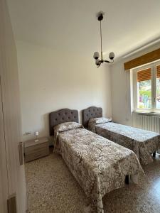 Ένα ή περισσότερα κρεβάτια σε δωμάτιο στο Casa Letrei