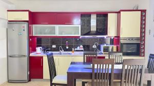 Η κουζίνα ή μικρή κουζίνα στο Alexandra apartment