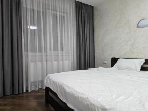 Postel nebo postele na pokoji v ubytování Modern apartment on Belvedere