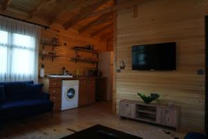 Kuchyň nebo kuchyňský kout v ubytování Lake Wood House + 19 fotografií