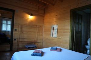 Postel nebo postele na pokoji v ubytování Lake Wood House