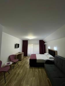 เตียงในห้องที่ Casa Melamy +29 ภาพ