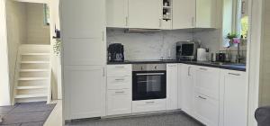 Η κουζίνα ή μικρή κουζίνα στο Modern studio house in Rosso +11 φωτογραφίες