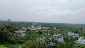 Φωτογραφία από το άλμπουμ του Veu Ragamalika Apartment with Fully Equipped Kitchen, Balcony & Caretaker στο Κοτσί +26 φωτογραφίες