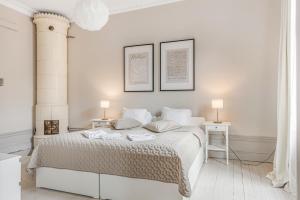 En eller flere senge i et værelse på Lägenhet med fantastiskt läge