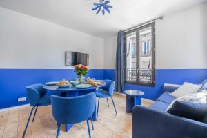 TV a/nebo společenská místnost v ubytování City Center l 15min from Eiffel Tower by Car