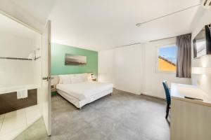 Voodi või voodid majutusasutuse Comfort Hotel Orleans Saran toas