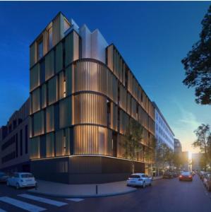a rendering of a building with cars parked in a parking lot at Hotel Pax Atocha in Madrid