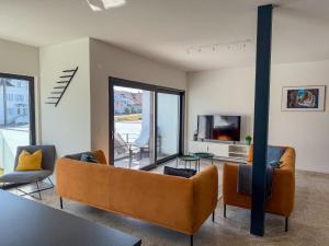 TV in/ali zabaviščno središče v nastanitvi Lakeside Ermatingen