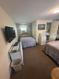 TV a/nebo společenská místnost v ubytování Boulevard Motel