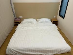 屋顶民宿 객실 침대