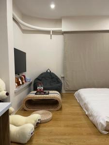 屋顶民宿 객실 침대
