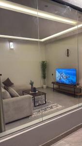 Photo de la galerie de l'établissement شقة أنيقة بصالة وغرفة نوم مع جلسة خارجية, à Abha