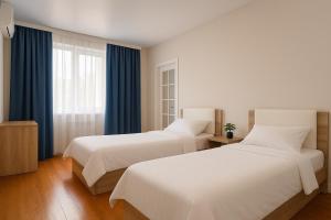 Postel nebo postele na pokoji v ubytování SEDEP Guesthouse