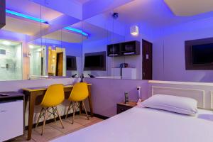 En eller flere senge i et værelse på Motel Veleiros - Zona Norte