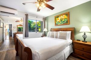 KBM Resorts Stunning Ocean Views Spacious 2-Bedroom Napili Point Collection Multi Unit Listing Same Building 2 Free Rental Cars NAP-A25B26 tesisinde bir odada yatak veya yataklar