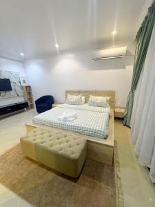 Postel nebo postele na pokoji v ubytování Daffodil House Lekki Phase 1