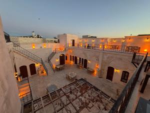 an aerial view of a building with a patio at Efruzhan Hotel in Sanlıurfa